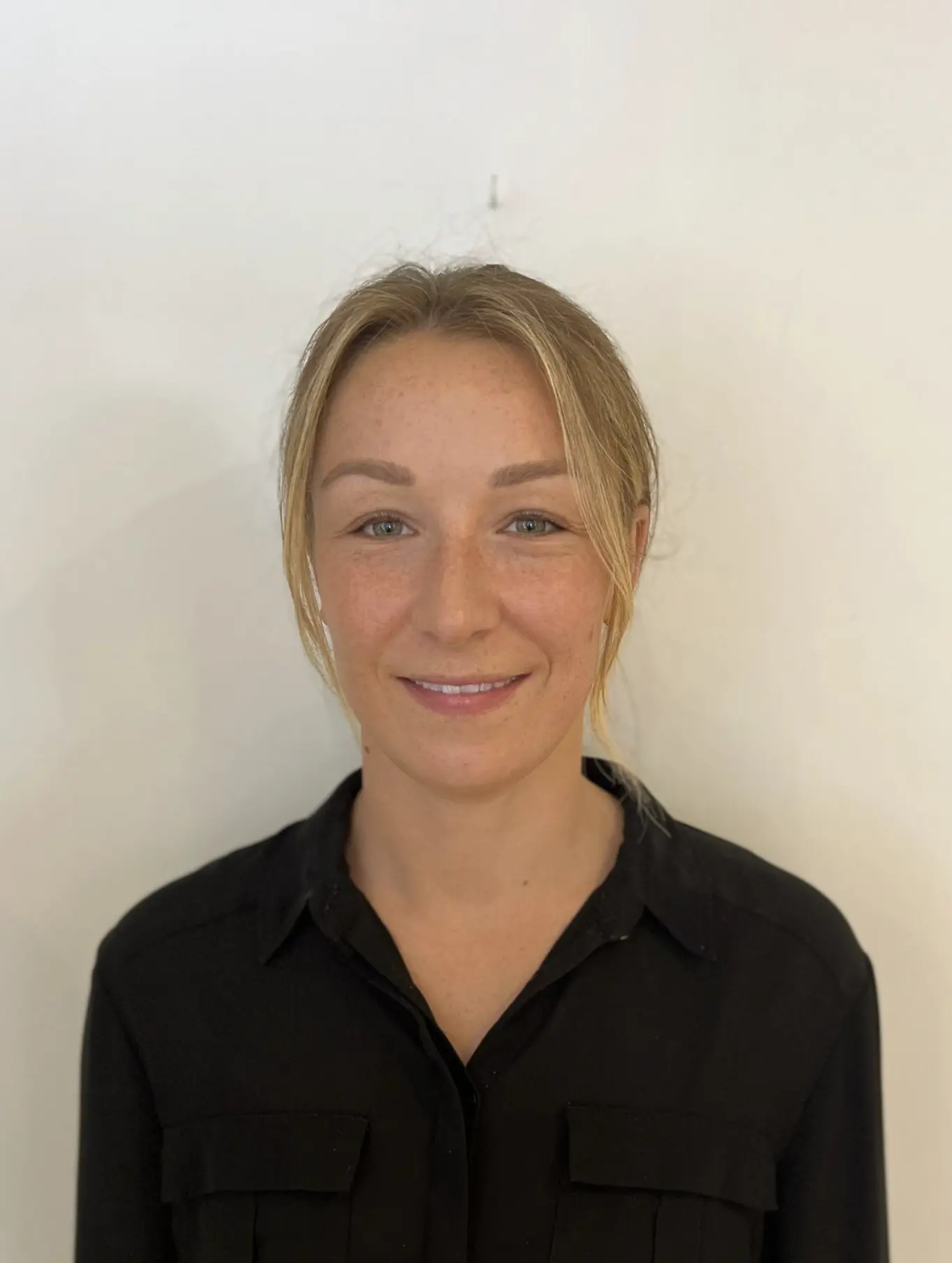 A portrait photo of Dr. Laura, Chiropractor